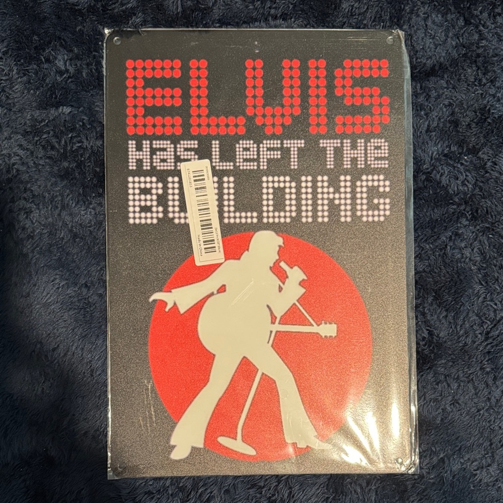 Elvis Metal Sign with Red and White Design